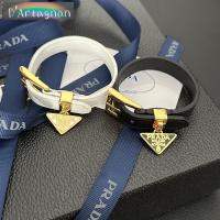 ราคา {Boutique} PP Saffiano Leather Bracelet Triangle Metal Logo Leather Bracelet Brass Gold-Plated with Steel Seal Korea 2025 Retro Non-Fade Womens Bracelet H9906 (45705054291)