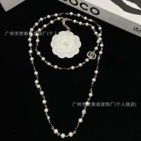 ราคา สร้อยคอมุกและคริสตัล.Black Chanel Style เสื้อกันหนาวสำหรับผู้หญิง (52403026446)