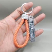 ราคา พวงกุญแจเชือกหนังถักเพชร จี้แท๊คตัวเลขเพชร พวงกุญแจรถมอไซร์ พวงกุญแจรถยนต์ (17097993147)