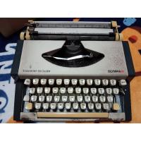 ราคา เครื่องพิมพ์ดีดเก่า olympia Traveller de Luxe (25778570285)