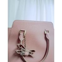 ราคา กระเป๋า CHARLES &​ KEITH สะพายข้าง กระเป๋าถือ สีชมพูกะปิ นู้ด มือสอง (7337394016)