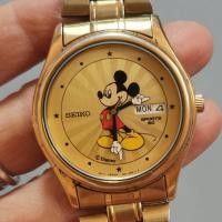 ราคา นาฬิกามือสอง 1980 Vintage Mickey Mouse by Seiko ระบบควอตซ์ สายเดิม ตัวเรือนมีรอยจากการเวลา ตัวสายสีทองซีดจางตามรูป (24708932470)