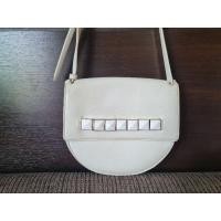 ราคา กระเป๋า CK Charles&Keith สีขาว มือสอง(ตำหนิรอยแตก) (20457132965)