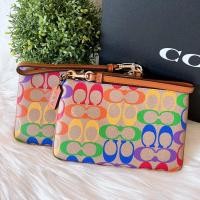 ราคา พร้อมส่งแท้% Coach Small Wristlet In Rainbow Signature Canvas • Style No. CA217 (19289139599)