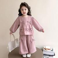 ราคา ชุดฤดูใบไม้ร่วงสำหรับเด็กหญิง ชุดสองชิ้นจากผ้าฝ้ายแท้ สไตล์เกาหลี ตกแต่งด้วยโบɑและกางเกงขาบาน (56102721572)