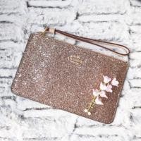 ราคา COACH SMALL WRISTLET WITH GLITTER STAR PRINT (1623640831)