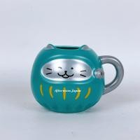ราคา ( พ ร้ อ ม ส่ ง ) มัคเซรามิคใบเขียว มาเนกิเนโกะในสไตล์ดารุมะ New Year New Japan collection (24722228613)