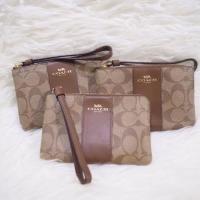ราคา พร้อมส่ง #COACH #F58035 CORNER ZIP WRISTLET IN SIGNATURE COATED CANVAS WITH LEATHER STRIPE (2858493679)