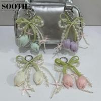 ราคา พวงกุญแจริบบิ้นดอกทิวลิปและมุก สไตล์โบว์ เครื่องประดับกระเป๋าและโทรศัพท์มือถือ (48956099598)