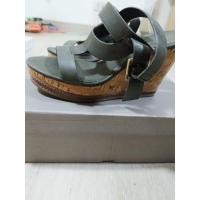 ราคา รองเท้ารัดส้นไซร้37" ส้นสูง3"สีเขียวขี้ม้า แบรนด์charles&keith (22446128441)