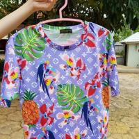 ราคา เสื้อยืดสีม่วงลายดอก (1788903764)