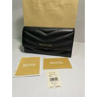 ราคา กระเป๋าสตางค์ Michael Kors Jet Set Travel Large Quilted Tri-Fold Wallet สีดำ (49054910668)