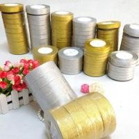 ราคา ริบบิ้นผ้าสีทอง ริบบิ้นเนื้อทรายสีทอง และสีเงิน หน้ากว้าง 2CM (1 ม้วน) (9085847920)