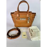 ราคา กระเป๋า Coach F37444 Swagger 21 carryall in pebble leather มีถุงผ้า รับประกันของแท้ 100% (27936912717)