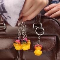 ราคา เป็ดน้อยสีเหลืองน่ารักพร้อมหมวกพวงกุญแจ-กระเป๋ากระเป๋านักเรียนการ์ตูนเป็ดเสน่ห์จี้กุญแจรถแหวนตกแต่ง (50855118466)