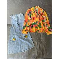 ราคา Valley Girl ชุดเซ็ท2ชิ้น เอี๊ยมกระโปรงยีนส์มาพร้อมเสื้อผลไม้ ชุดมือ2 (26116199941)
