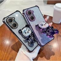 ราคา เคสโทรศัพท์ สำหรับ oppo A5pro A18 A38 A58 A78 A17 A17K A16 A57 A77S Reno 15 pro max หมี LOVE กริตเตอร์ เคส ตั้งได้ Z1 (47956061672)