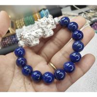 ราคา ข้อมือหินลาพิสพร้อมปี่เซี่ยะเงินแท้99.99 (52408229990)