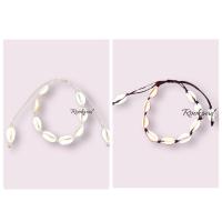 ราคา สร้อยข้อมือเชือกเทียนถักหอยเบี้ย (25684088371)