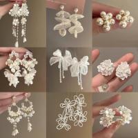 ราคา Popular~Silver needle earrings with diamonds and pearl flowers, tassel earrings with a niche vibe, stylish and luxurious high-end earrings3z (53759068418)