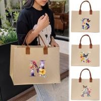 ราคา กระเป๋าผ้าสักหลาดสีขาว กระเป๋าถือแบบโท้ท กระเป๋าช้อปปิ้งแบบถือ กระเป๋าถือสำหรับผู้หญิง พิมพ์ลายผีเสื้อและตัวอักษร (40869628115)