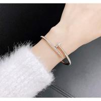 ราคา กำไลตะปูคาร์เทียแต่งเพรชไม่ลอกไม่ดำ (8910808449)