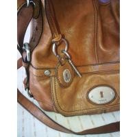 ราคา กระเป๋าหนังสะพายข้างหรือครอสบอดี้ Fossil(ฟอสซิ่ล)​แท้%มือสองสีน้ำตาล (9107360069)