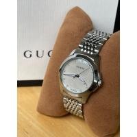 ราคา GUCCI G-Timeless Diamond หน้าปัดมุกสีขาว หลักเพชรแท้ 12 เม็ด (43005206879)