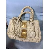 ราคา กระเป๋า Miu Miu แท้ 100% สีครีม ขายตามสภาพ เอาไปสปาเองนะคะ (57557180265)