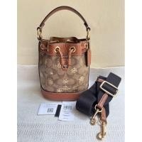 ราคา UsedCoach Dempsey Drawstring Bucket Bag 15 With Snowflake Print แท้❌มือสอง (28981347633)