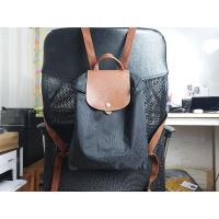 ราคา ของแท้กระเป๋าเป้สะพายหลัง Longchamp รุ่น le pliage สีดำ หนัง น้ำตาล สภาพประมาณ 80% ตำหนิซิปแตก มีฟองอากาศตรงก้นกระเป๋า (27854120434)