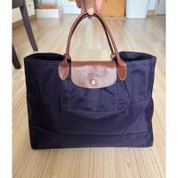 ราคา กระเป๋าถือ Longchamp มือสอง ของแท้% สภาพดี มีร่องรอยการใช้งานบ้าง ไม่มีตำหนิแตกขาด (50007222313)