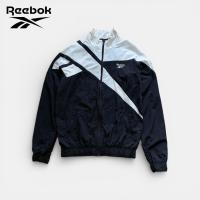 ราคา เสื้อแจ็คเก็ตมือสอง Reebok อก 44 ยาว 28 (size M) ผ้าร่ม สีขาว-สีดำ สภาพดี ไม่มีตำหนิ (42027849234)