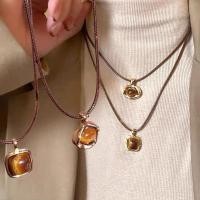 ราคา สร้อยคอจี้หินตาเสือ หนังวินเทจ เชือกพลอยสีน้ำตาลเรขาคณิต พร้อมสายปรับได้ (40003301159)