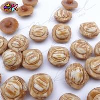 ราคา somkid กระดุมลายหินอ่อนสีน้ำตาลปนขาว ตรงกลางนูน ขนาด15mm (size24L) มีขอบข้าง เนื้อพลาสติกอย่างดี มีขาสอยก้น (25409225397)