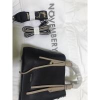 ราคา ค่าส่งฟรี กระเป๋าถือสีดำ แบรนด์ Novembery ของแท้มือหนึ่ง (9776653128)