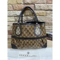 ราคา กระเป๋า Gucci Brown Coated Canvas Monogram Crytal Mix Tote (18566767711)