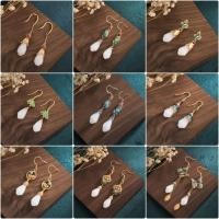 ราคา ใหม่สไตล์จีนออกแบบเคลือบหยกสี 925 เข็มเงินเลียนแบบ ร้อน หยกกล้วยไม้ต่างหูโบราณสไตล์โบราณกลางต่างหูพู่ยาวโหลออกต่างหูดอกไม (28682989891)