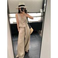 ราคา #W5396 ชุดเซ็ท 2 ชิ้น เสื้อกั๊กแขนกุด แต่งกระดุม ด้านหลังมีสายปรับได้ มาพร้อมกางเกงขายาวทรงขาบาน จับจีบด้านหน้า (42600946662)