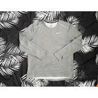 ราคา เสื้อกีฬามือสอง NIKE สีเทา แท้ (21286393103)