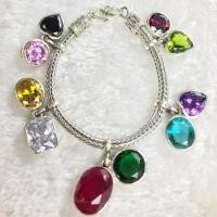 ราคา สร้อยข้อมือพลอยนพเก้า ตัวเรือนเงินแท้ (48659041474)