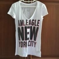 ราคา เสื้อยืด อเมริกัน อีเกิ้ล (American Eagle) สีขาว (แท้มือสอง) (1141956099)