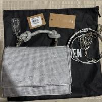 ราคา กระเป๋าถือ STEVE MADDEN รุ่น BKNOTTED สีเงิน (52165262688)