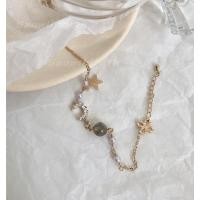 ราคา [SS] กำไลข้อมือรูปดาว พระจันทร์ เพชรสังเคราะห์ และไข่มุก ถูกสุดๆ (53512301139)