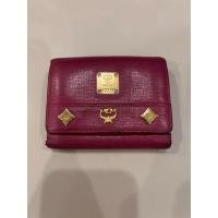 ราคา Used!! กระเป๋าเงิน MCM 3 พับเล็ก แท้ % - สีชมพูม่วง (48515111702)